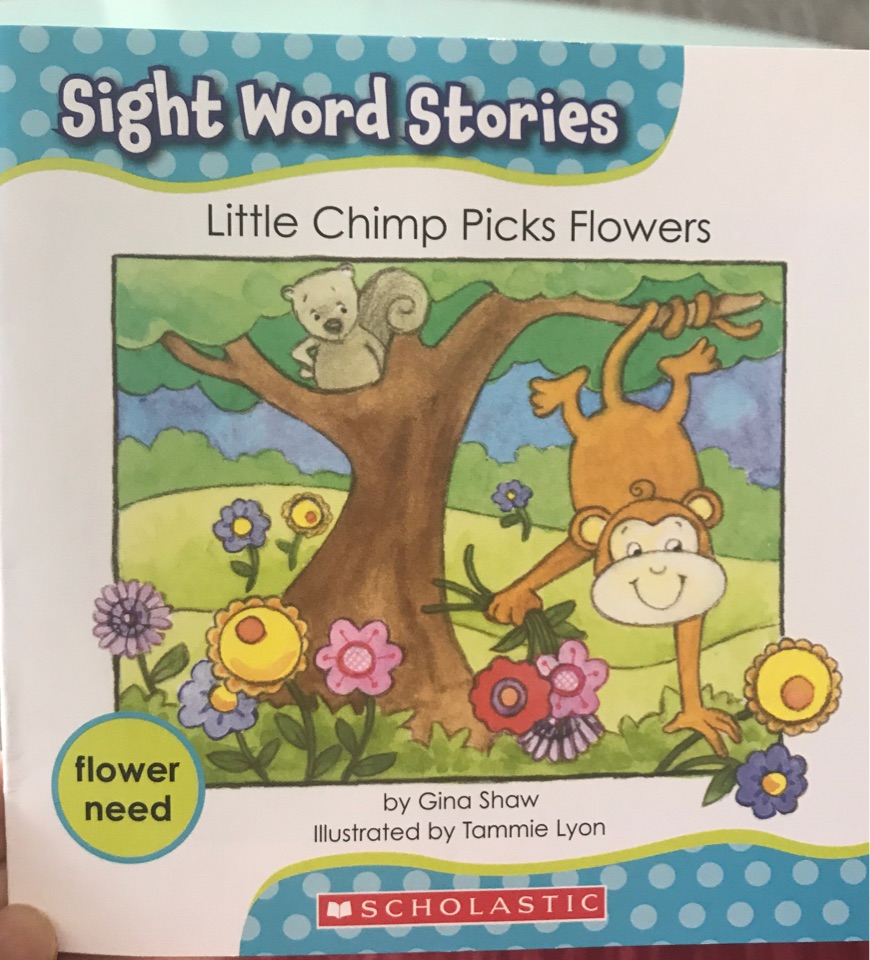 Little chimp picks flowers