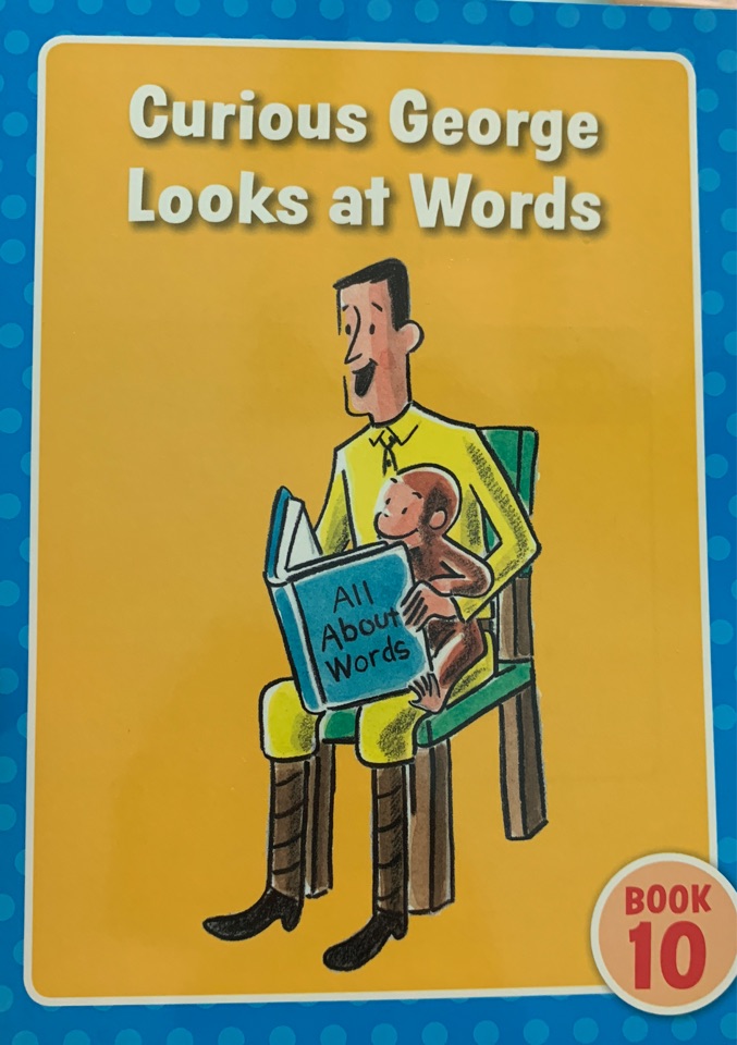Curious George looks at words